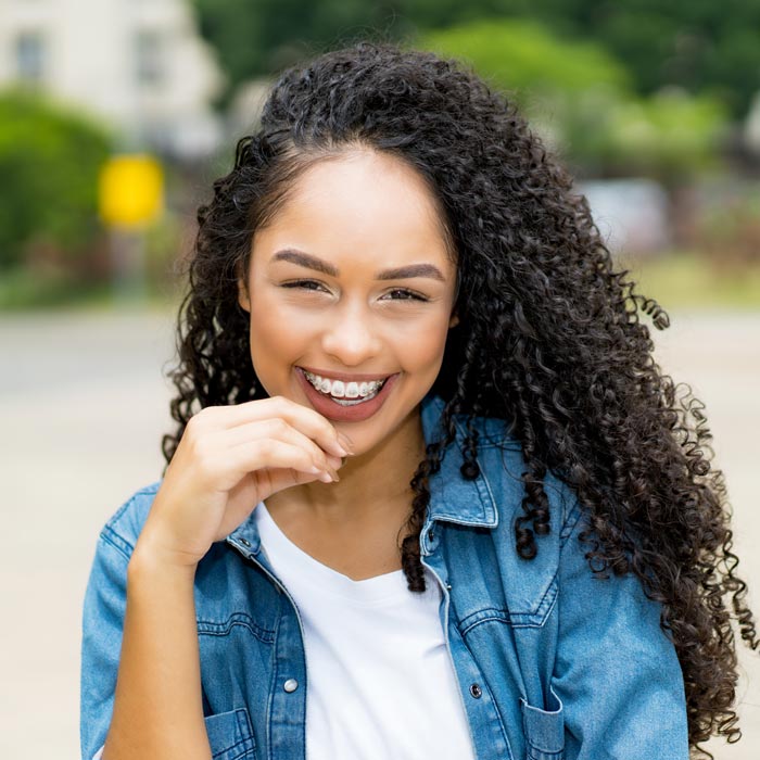 smiling woman with braces